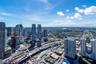 Expansive cityscape featuring high-rise buildings and infrastructure