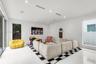 White tile flooring, recessed lighting, sliding glass door, and a large window