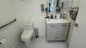 Modern vanity with a white rectangular sink