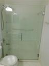 Downstairs Full Bathroom with White vanity with integrated sink, chrome faucet, and overhead lighting