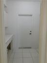 2nd Full Bathroom Upstairs - Dual vanity with integrated sinks, white cabinetry, and a large wall-mounted mirror