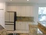 Kitchen nicely opens to Family Room and Breakfast nook.