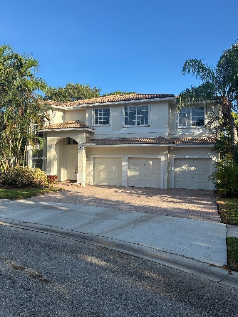 Exterior and interior freshly painted - 2nd Floor Accordion Shutters/First Floors panels, 3 Car Garage and an ample pavered driveway.