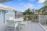 Front exposure deck off kitchen. Located on second story.