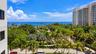 Expansive oceanfront scenery with abundant tropical foliage