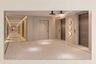 Hallway with integrated ceiling lighting, recessed wall lighting, and two stainless steel elevators