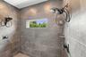 This is designed for 2 NFL Football players to shower at the same time.
