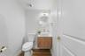 1st floor bathroom featuring a Floating vanity along with upgraded accessories