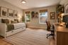 Staged bedroom to show guest bedroom/ Office possibilities.
