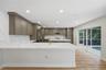 Large sliding doors show case the scenic pool area