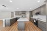 Oversized Island featuring abreakfast bar