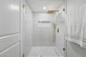 1st Floor bathroom feautring a stunning porcelain-tiled walk-in shower