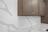 Full-height Calacatta Quartz countersplash