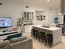 Spacious open-concept layout with tile flooring