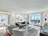 Expansive living area with wood-finish flooring