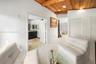 Wood-finish plank ceiling with recessed lighting