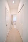 Recessed ceiling light, paneled interior doors, wood-finish flooring, bi-fold closet doors, and light wall finishes