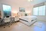 Recessed lighting, wood-finish flooring, ceiling fan, and multiple windows with vertical blinds
