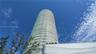 Curvilinear high-rise architecture with multiple private balconies