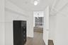 Walk-in closet with wire shelving, recessed lighting, and wood-finish flooring
