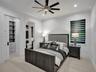 Contemporary dome pendant light fixture featuring a brushed metallic finish, matte black housing, and multifaceted glass crystal detailing