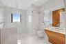 Primary Bathroom #2 with large walk-in shower.
