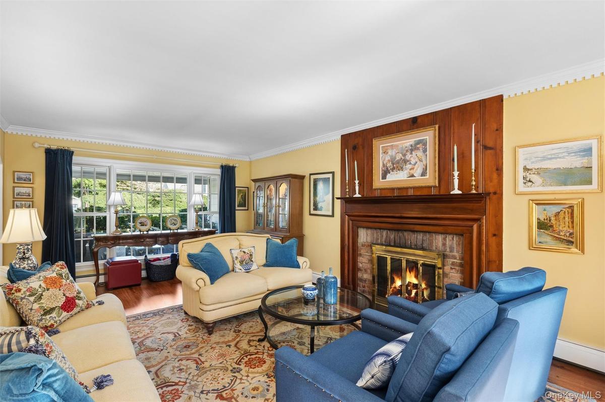 Accessible from the entry foyer or the kitchen, the living room is a perfect entertaining space