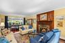 Accessible from the entry foyer or the kitchen, the living room is a perfect entertaining space