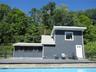 Opens up directly to fenced in pool area