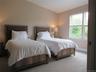 En-suite bedroom and bath with river views