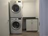Laundry room with storage cabinet