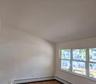 Cathedral ceiling, hard wood floors, and newer multi-pane windows