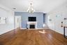 living room with wood burning fireplace