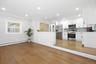 Den off of the Kitchen creates a space perfect for being a part of everything while preparing meals.