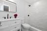Primary Bathroom has beautiful tile for a calming spa like experience