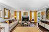 Living area featuring hardwood flooring, recessed lighting