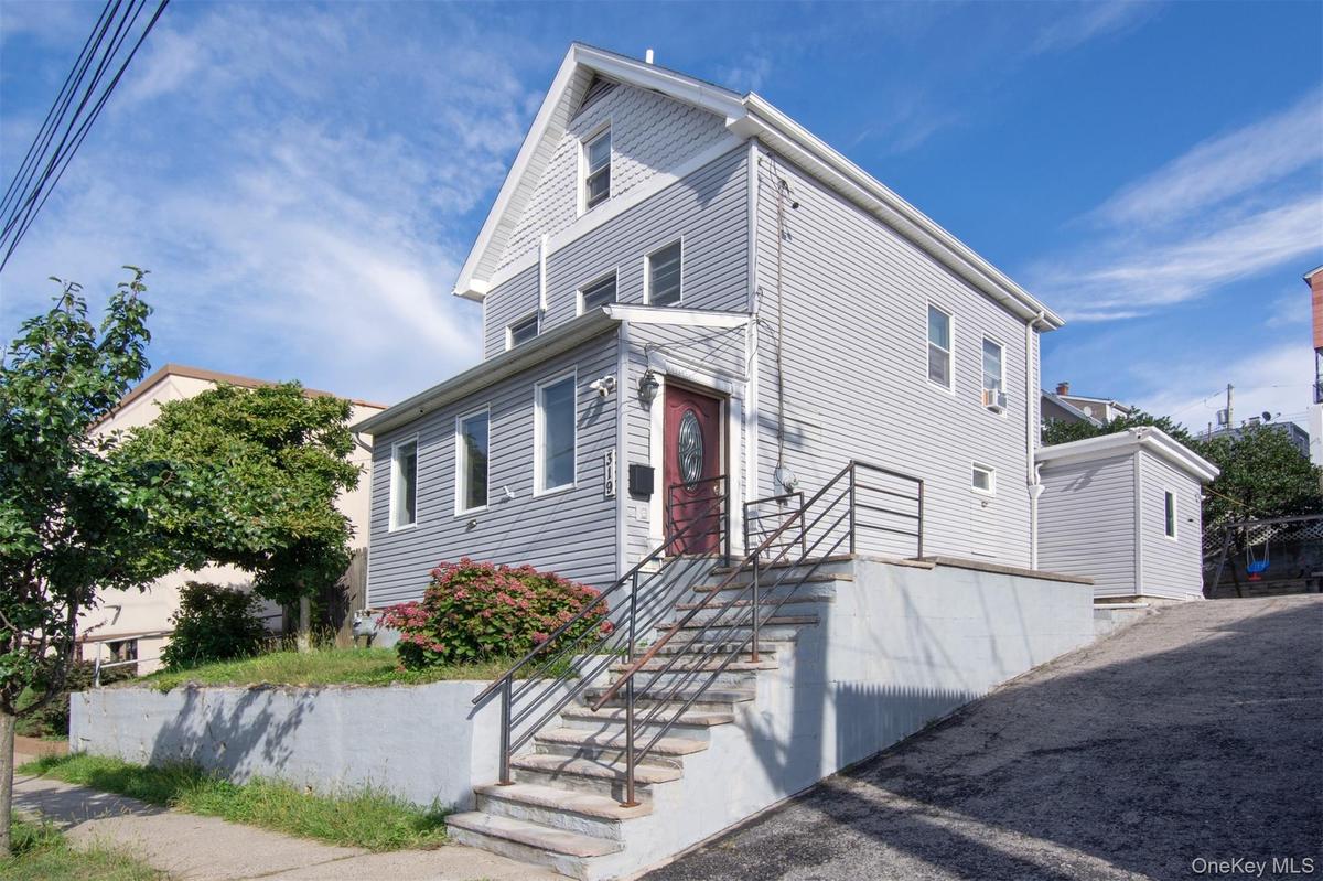 Lovely Home with long driveway . Plenty of parking!!