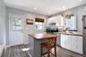 Eat in Kitchen with SS appliances. Access to backyard