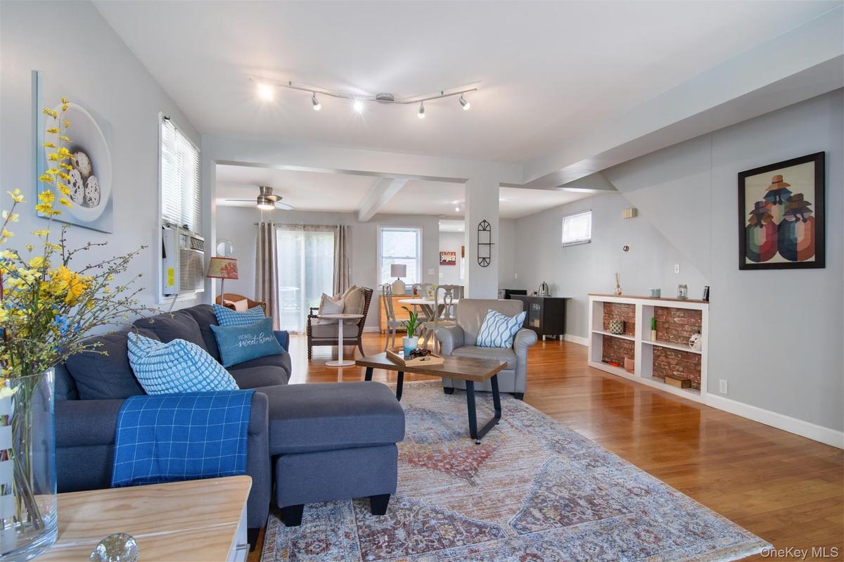 Open floor plan with living room, dining area and TV viewing area