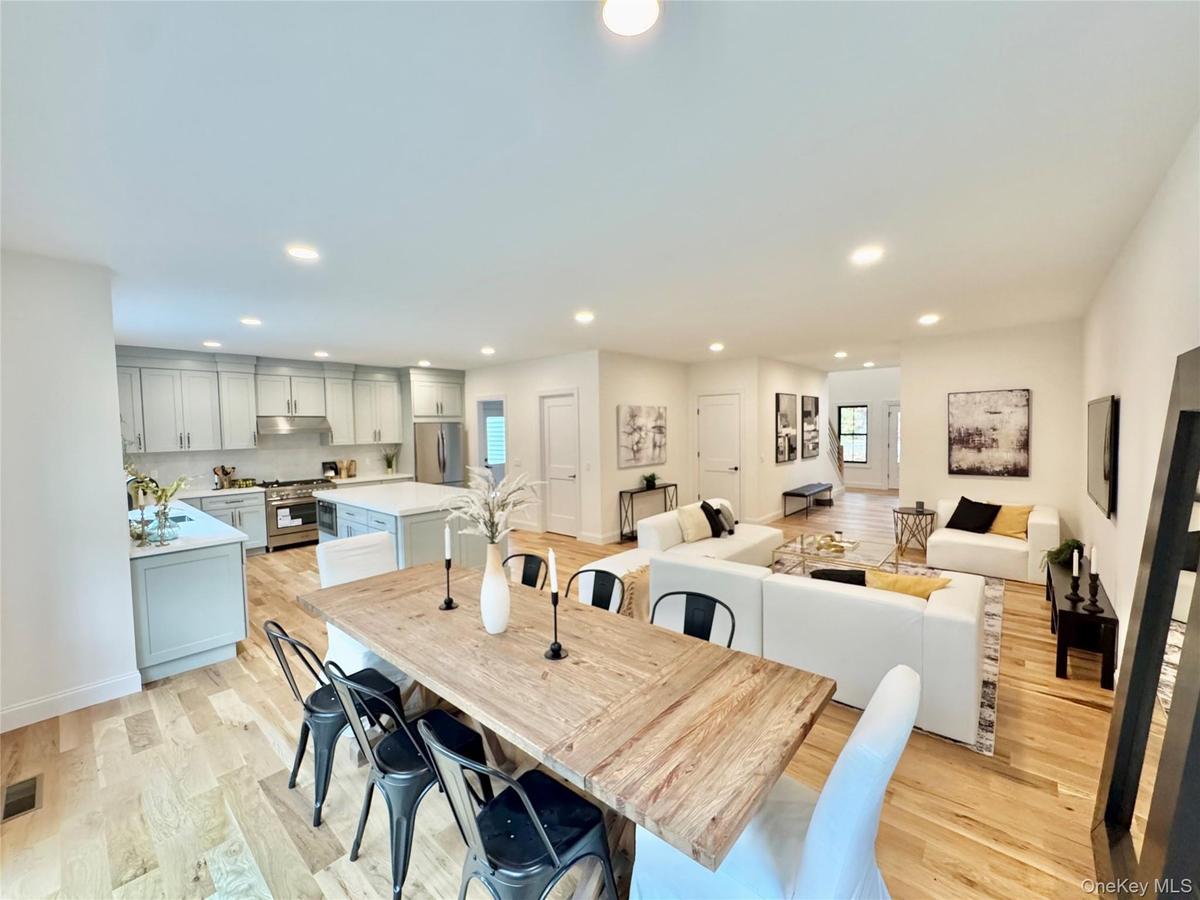 Dining space featuring recessed lighting and light wood-style flooring