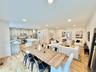 Dining space featuring recessed lighting and light wood-style flooring