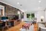 Family room has large sliding glass door to the backyard
