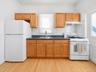 First Floor:(2 Bedroom Apartment with a rear enclosed porch)