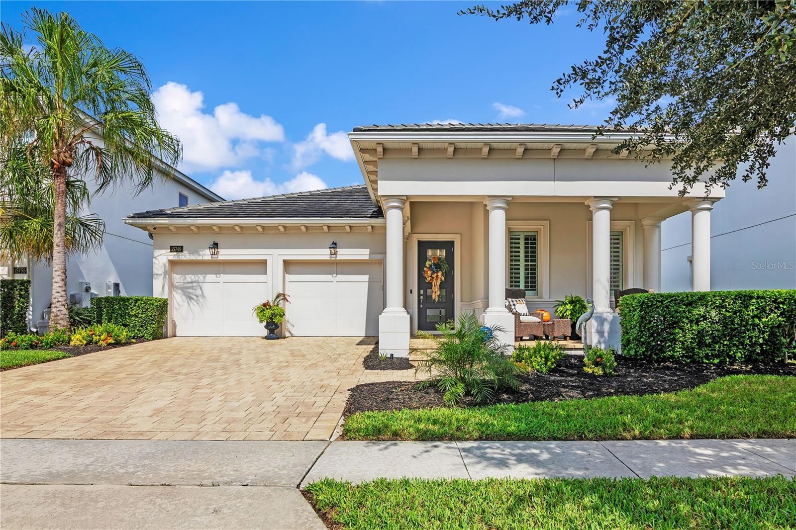 Beautifully designed residence featuring attractive architectural details and inviting curb appeal.