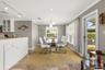 An existing two-bedroom, 1.5-bath cottage currently occupies the property.