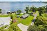 Rare Lake Sheen lakefront estate opportunity on the Butler Chain of Lakes! An exceptional opportunity to build a custom luxury lakefront residence on 