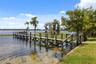 A private dock and boatlift provide access to Lake Sheen and the entire Butler Chain, while a gated community boat ramp is approximately 300 feet away