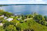 Rare Lake Sheen lakefront estate opportunity on the Butler Chain of Lakes! An exceptional opportunity to build a custom luxury lakefront residence on 