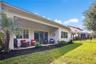 Enjoy Florida living from the covered patio, ideal for outdoor dining and relaxation.