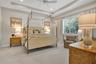 Elegant primary suite offering a peaceful retreat with sophisticated finishes.